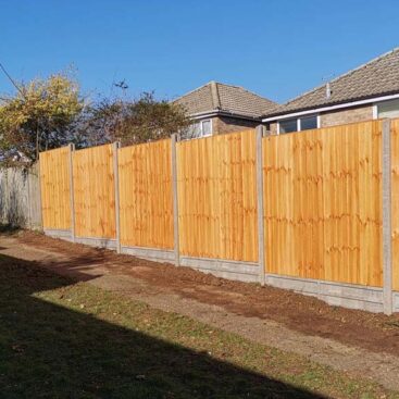 brand new fence with concrete posts